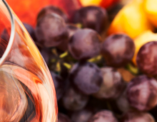 rose wine and grapes in summer